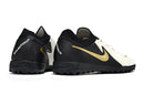 Chaussure de foot Nike Phantom GX 2 Elite TF noire, blanche et dorée "Mad Ready Pack"