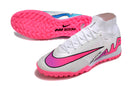 Chaussure de foot Nike Air Zoom Mercurial Superfly 9 Elite TF blanche et rose.