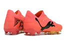 Chaussure de foot Puma Future 7 FG rose.