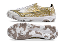 Chaussure de foot Mizuno Alpha TF blanche et dorée "Prism Gold Sérgio Ramos"
