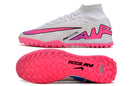 Chaussure de foot Nike Air Zoom Mercurial Superfly 9 Elite TF blanche et rose.