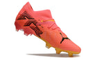 Chaussure de foot Puma Future 7 FG rose.