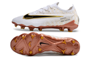 Chaussure de foot Nike Phantom GX Elite FG blanche et dorée "United Golden Pack"