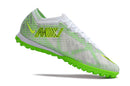 Chaussure de foot Nike Air Zoom Mercurial Vapor 15 Elite TF, blanche et verte.