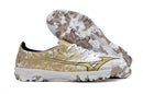 Chaussure de foot Mizuno Alpha TF blanche et dorée "Prism Gold Sérgio Ramos"