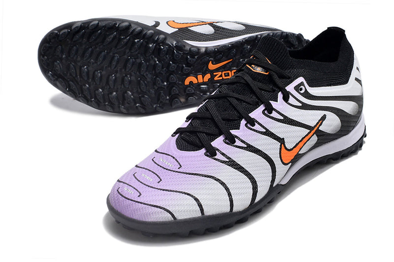 Chaussure de foot Nike Air Zoom Mercurial Vapor 15 Elite TF, blanche, violette et noire.