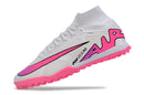 Chaussure de foot Nike Air Zoom Mercurial Superfly 9 Elite TF blanche et rose.