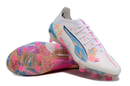 Chaussure de football Puma Ultra 5 Ultimate FG blanche, bleue et rose "Volume Up' Pack"