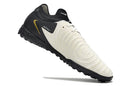 Chaussure de foot Nike Phantom GX 2 Elite TF noire, blanche et dorée "Mad Ready Pack"